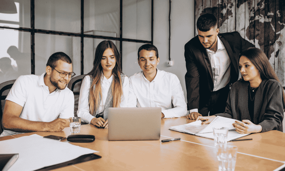 People in office talking about the power of SEO