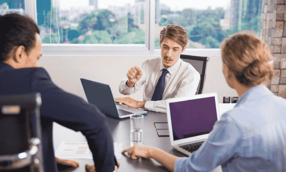 People in the office discussing about seo companies in USA